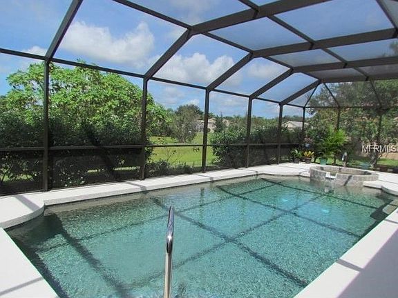 Over sized pool with private preserve behind