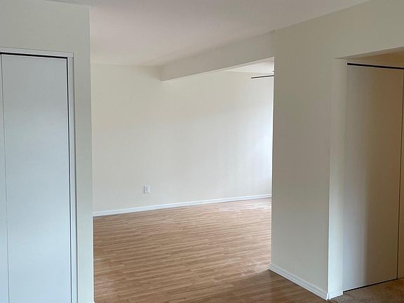 View from the living room towards the dining room and kitchen