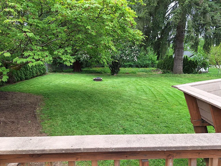 Private fenced-in backyard
