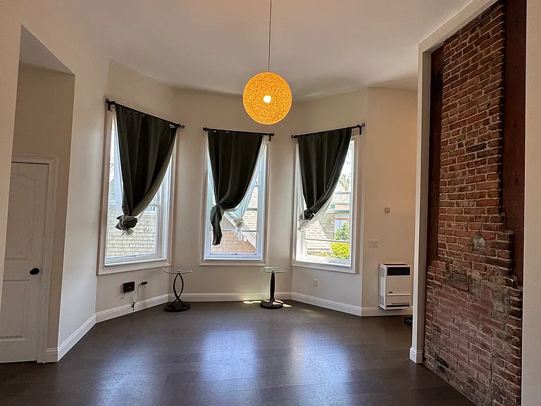 Living Room Angle 3 - Large Bay Windows 16 ft ceilings