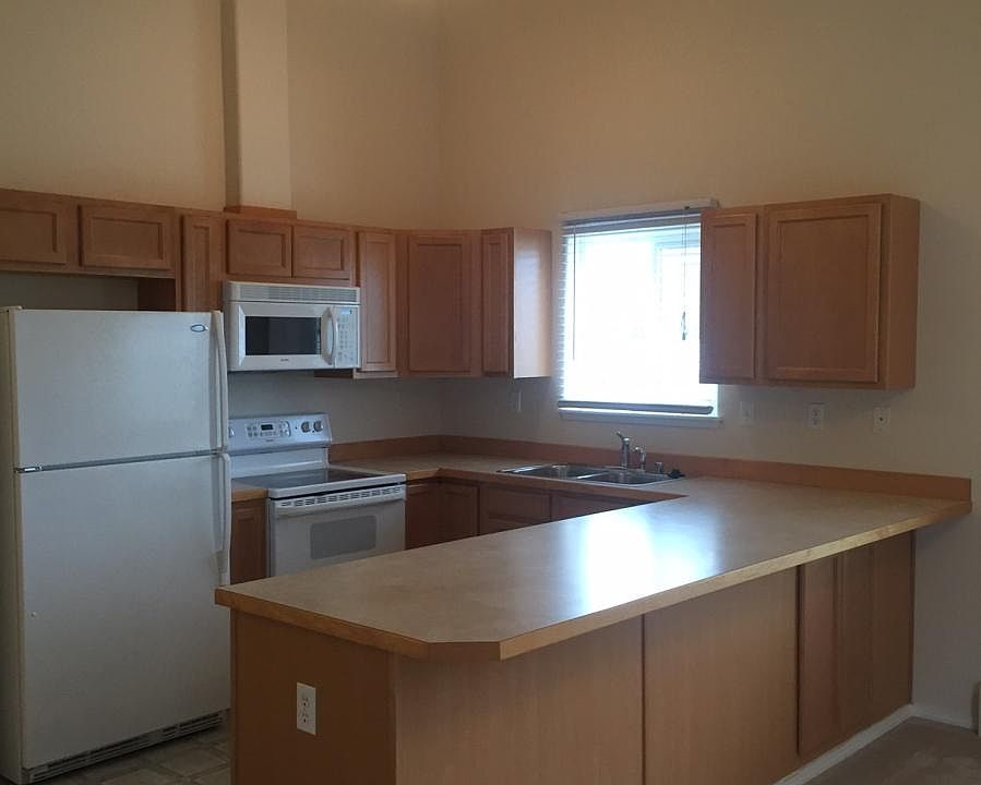 Large, sunny kitchen with vaulted ceiling