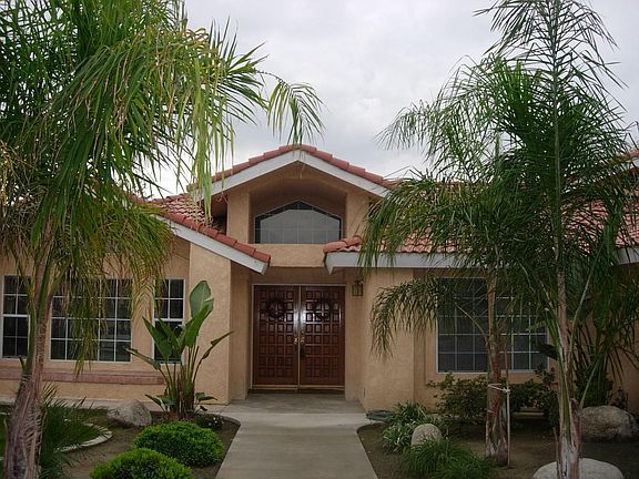 A VERY WARM SPANISH FEEL TO THIS HOME!!!