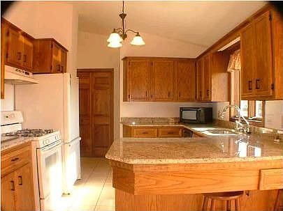 Kitchen with new granite counter tops