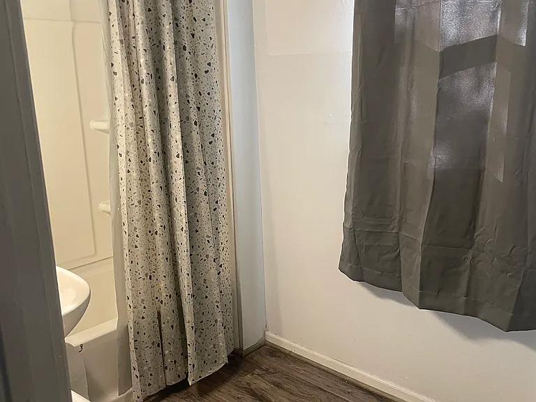 BATHROOOM TUB AND SHOWER