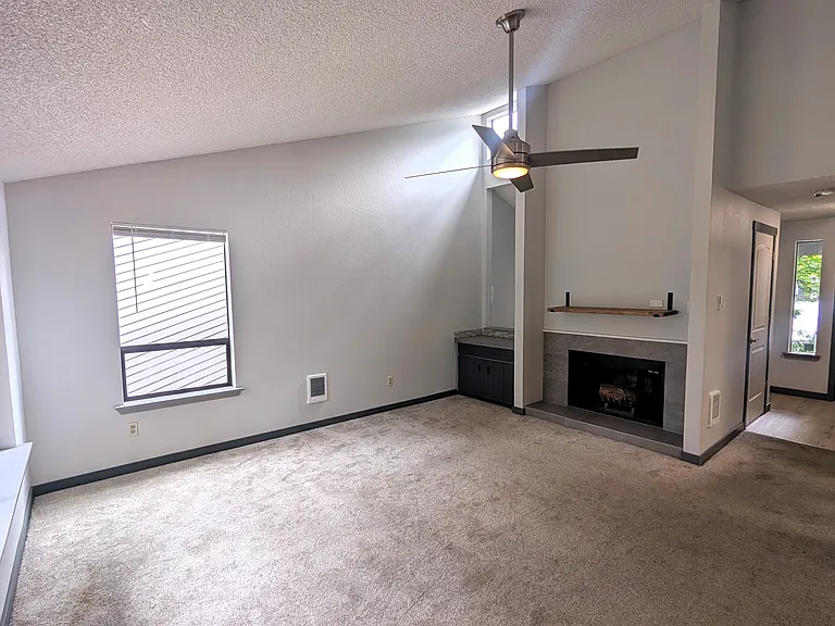 Main living area featuring a fireplace.