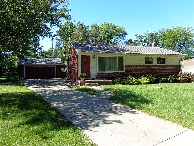 AFFORDABLE HOME WITH SO MUCH TO OFFER!!  Terrific neighborhood near Adams Elementary School. Situated on a cul-de-sac and large fenced backyard. Gorgeous hardwood flooring in living room, hall and bedrooms. Updated kitchen features new counter tops and appliances. Three bedrooms and two full bathrooms on the first floor.  Full basement with new carpeting in recreation room,  two car garage, screened porch and covered patio.  Central Air. Plenty of storage.  Move-in-ready!