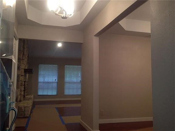 Entry with coffered ceiling - similar type ceiling to left in Front Dining area