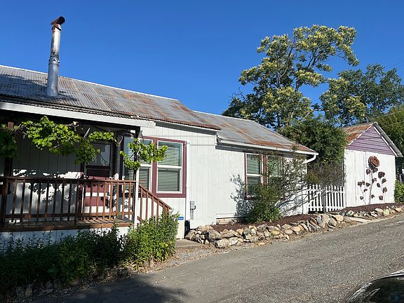 front door .picket side gate entrance to back yard
