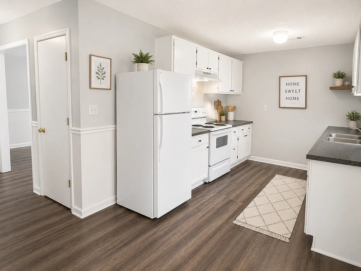 Move-in ready 2 bedroom, 1.5 bath duplex with central AC, LVP flooring, refrigerator, oven, updated finishes, spacious rooms, and modern colors throughout. Conveniently located near Columbus, GA and Fort Moore. - 2000 6th Ave #1A