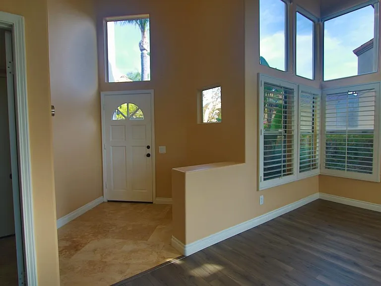 Foyer with travertine floors