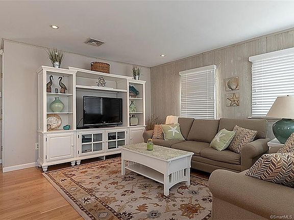 Large entertainment center wall - Beautiful hardwood flooring