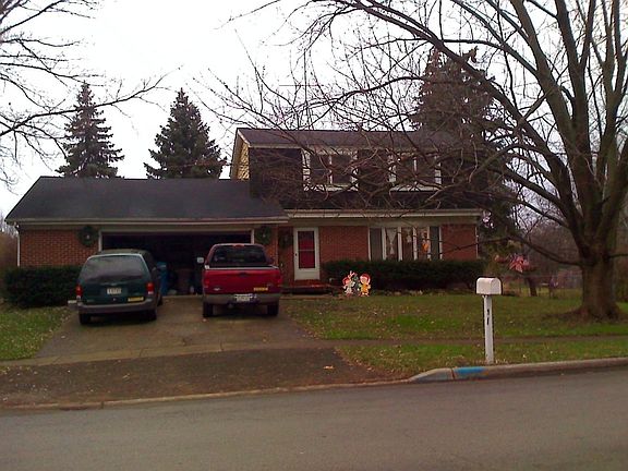 Front of house in the fall.