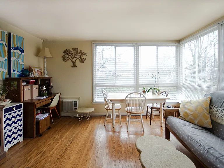 Experience the elegance and comfort of this sunlit living space, perfect for relaxation and gatherings.