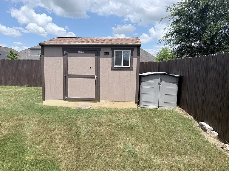 10 x 12 tuff shed + smaller rubber made shed