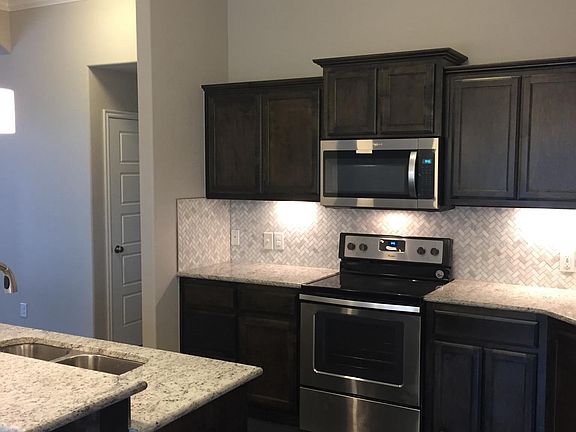 Kitchen with stainless steel appliances 