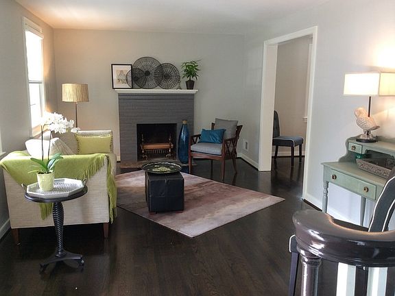 Living Room
						:
						Working fireplace with new cap.Hardwood floors newly sanded & finished.