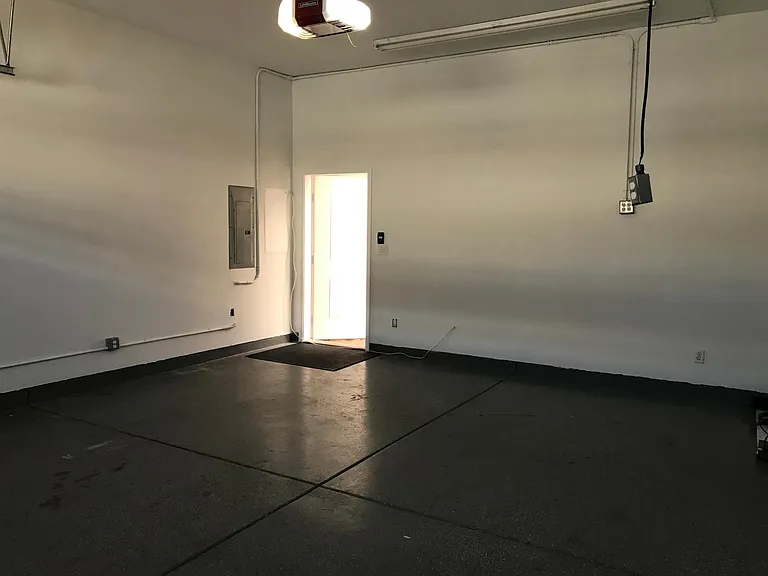Good sized two car garage. Access door leads right into the private courtyard