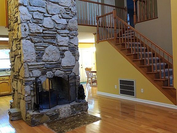 Den with Rock Fire Place