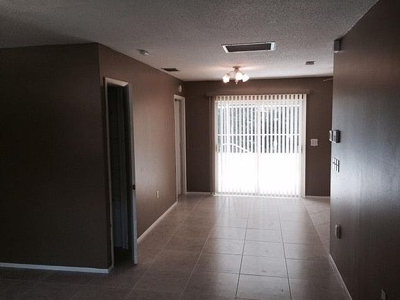 Dining Room with Sliders to Pool
