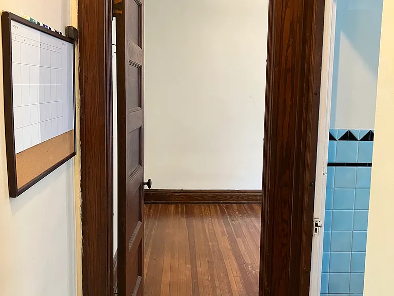 Enter bedroom off of kitchen