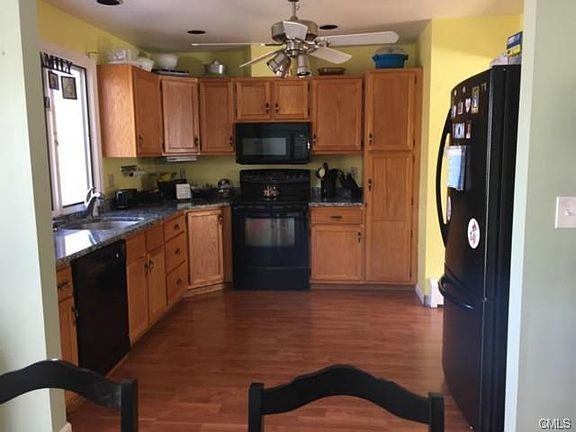 Kitchen with new granite countertop and new floor
