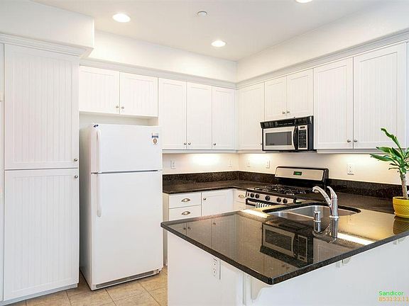 kitchen with granite countertops and plenty of storage