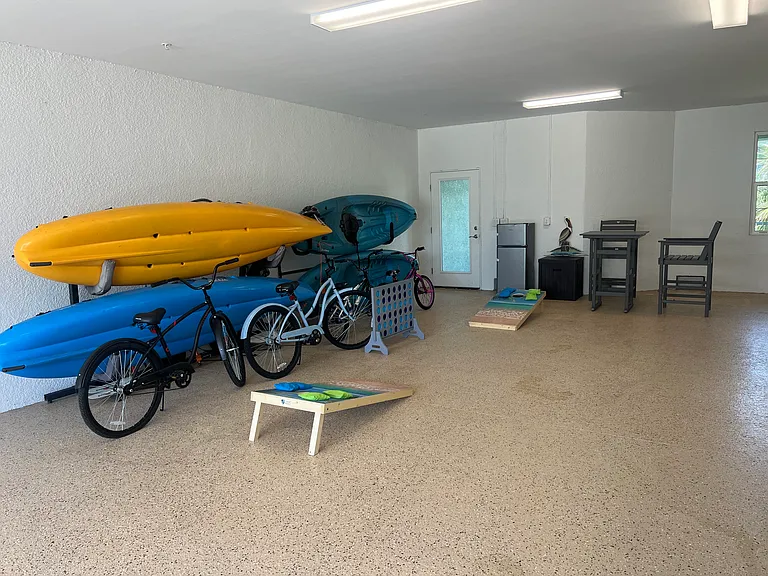 4 car garage - 2 Adult Hobie Cat Kayaks 2 Childrens Kayaks - 2 Adult Bikes - 2 Childrens Bikes