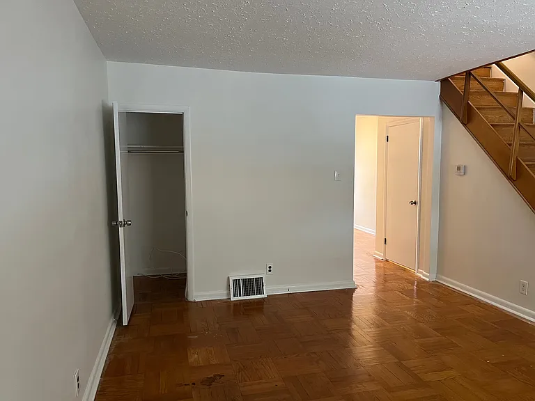 Living room with coat closet