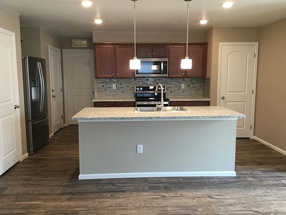 Kitchen with lots of cabinets and pantry