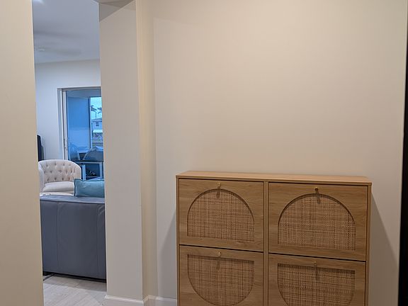 Front entry area with shoe cabinet