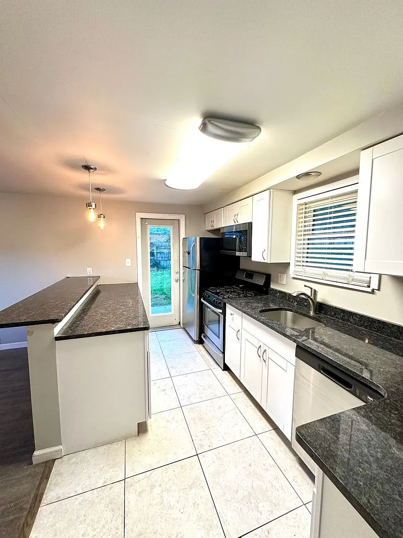 Updated 3 Bed, 1.5 Bath Home in Forest Hills - Available Now! — Photo 4