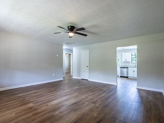 Generously sized living room with room for a full sectional, entertainment setup, and more.