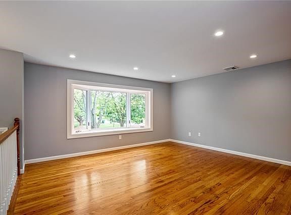 LIGHT BRIGHT LIVING ROOM WITH NEW LIGHTING