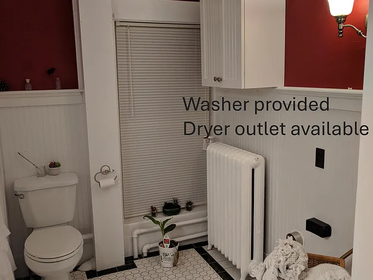 Note the vibrant colors, the wall sconces. 
Washing machine is provided. Dryer hookup available.