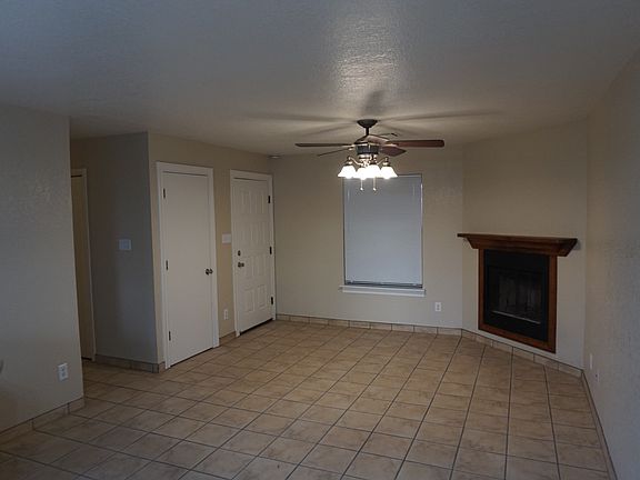 Living room with a cute fireplace!