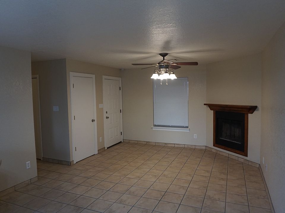 Living room with a cute fireplace!