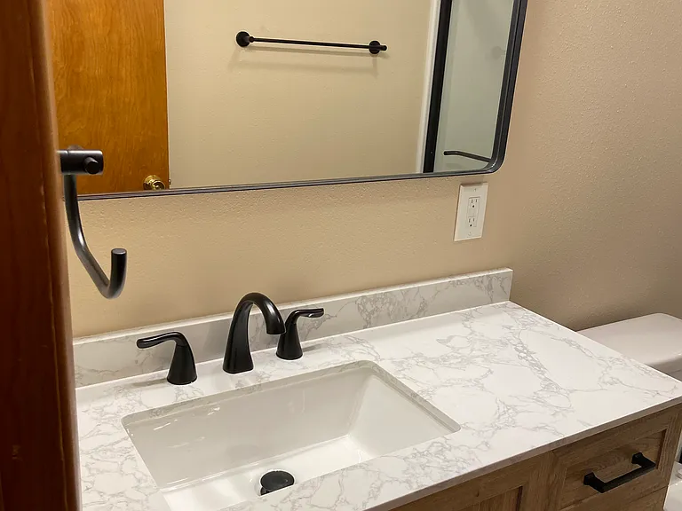 Vanity area of new bath near bedrooms