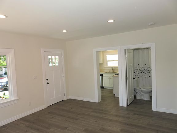 Living Room Looking Towards Kitchen and Bathroom