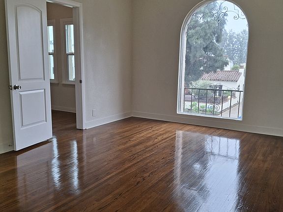 Bedroom with large walk in closet / home office space
