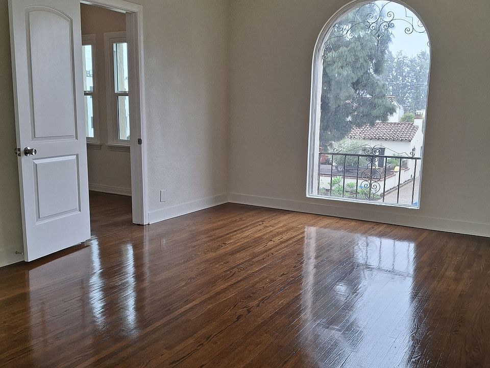 Bedroom with large walk in closet / home office space