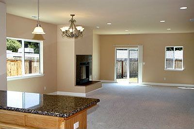 Great room w/fireplace opens to kitchen