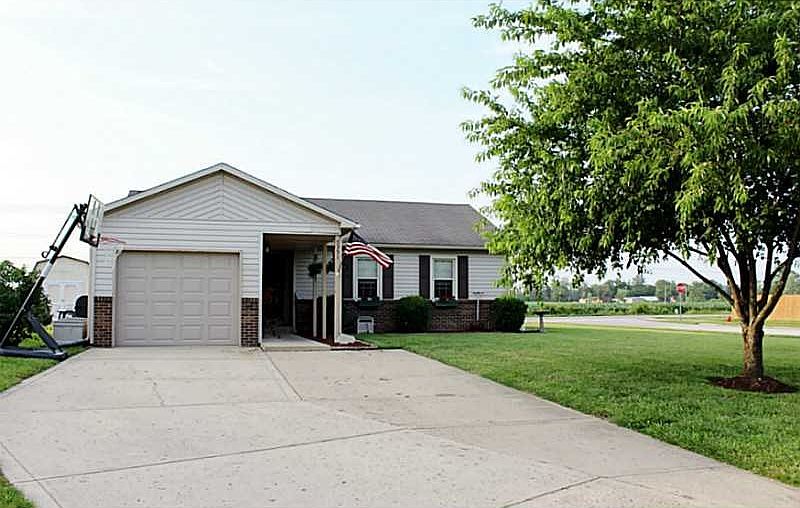 Exterior Front. CORNER LOT WITH GREAT CURB APPEAL. FRONT COVERED PORCH. EXTRA WIDE DRIVEWAY