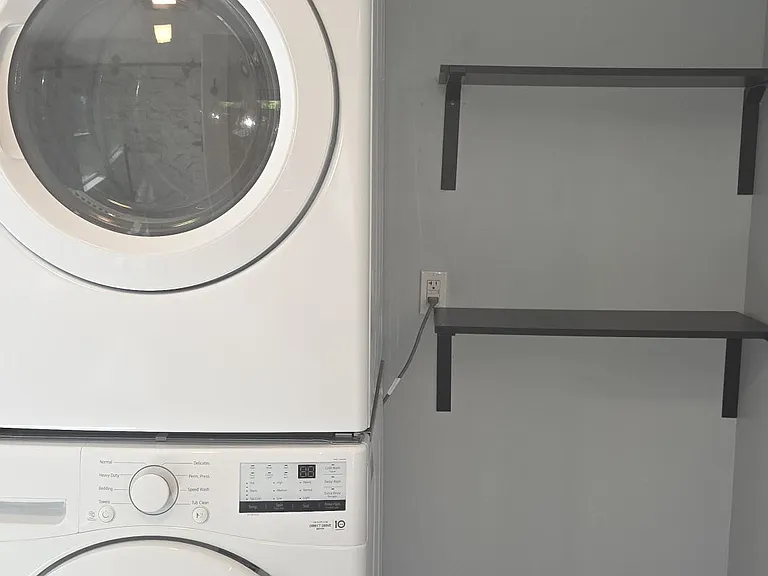 Stackable Washer & Dryer Located in Second Floor Bathroom