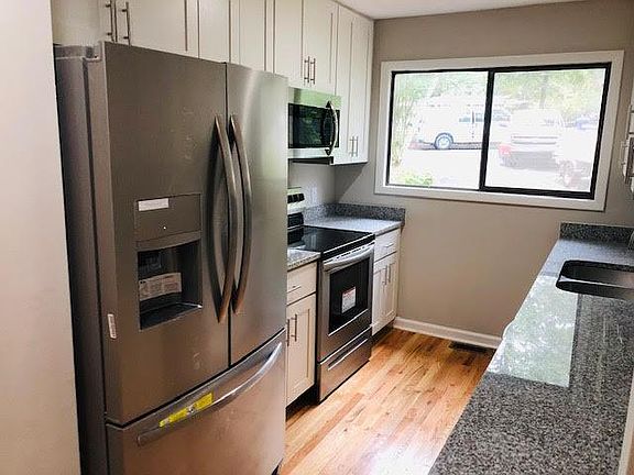 Brand new stainless steel appliances, French door refrigerator for plenty of storage and water/ice dispenser and granite counter tops.