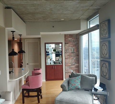 Living area with mirrored bar