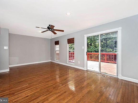 Living Room with Hardwood Floors & SGD to Deck