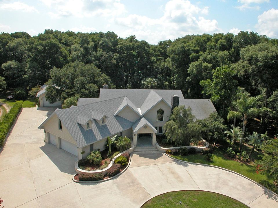 3114 Little Road, approximately 7000 sq. ft, pool, 2.4 acres, 7 bedrooms, 7.5 bathrooms, new roof, floors, kitchen, bathrooms, h