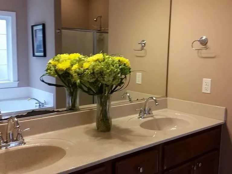First-floor Master Bathroom with two sinks. The picture also shows jetted tub and shower