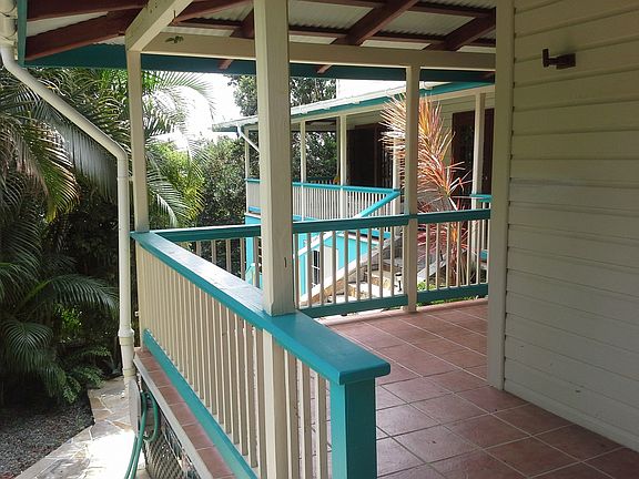 covered wrap around porch side