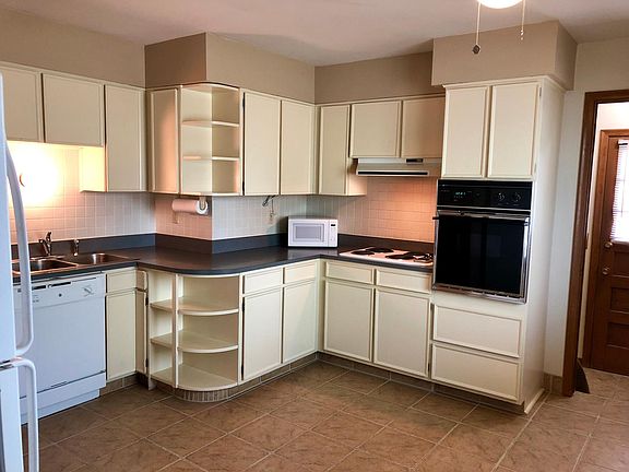 Eat in kitchen with tile floor